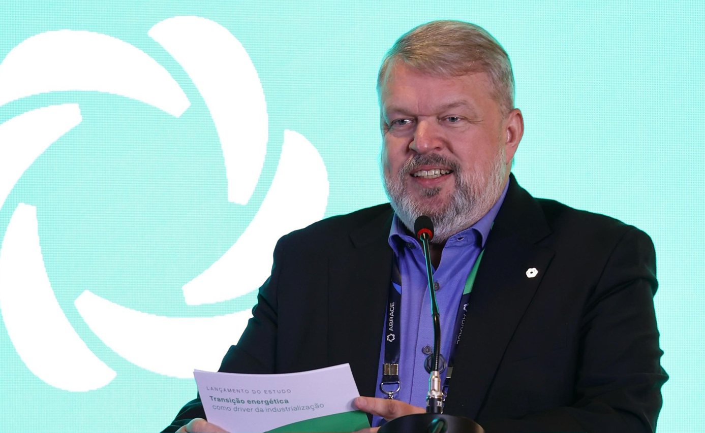 a man holding a paper