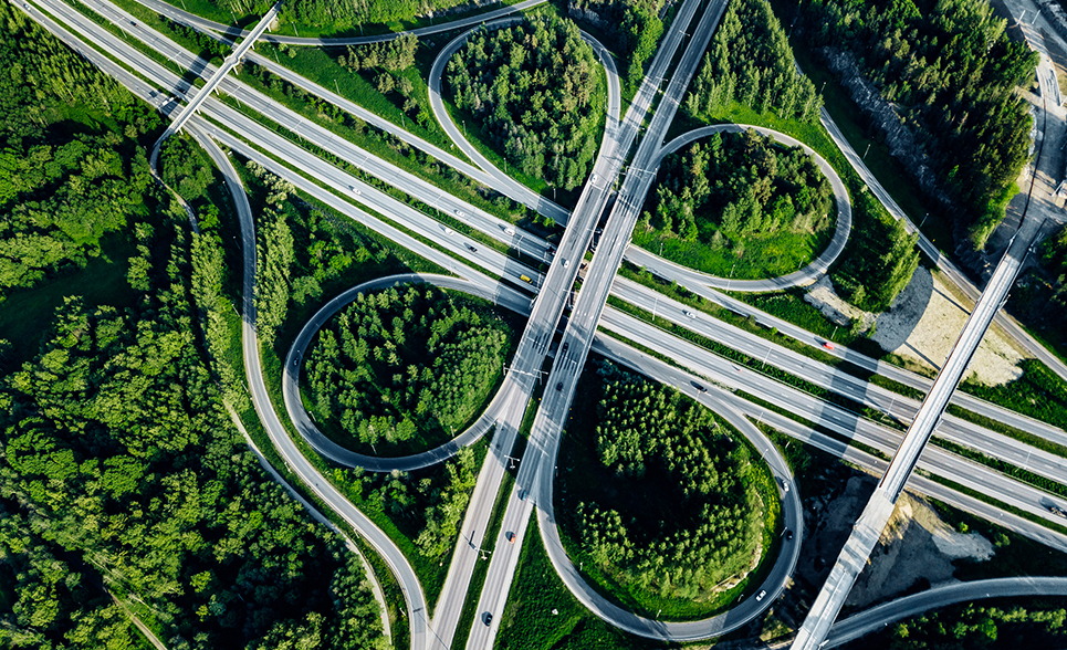 highway cloverleaf with trees