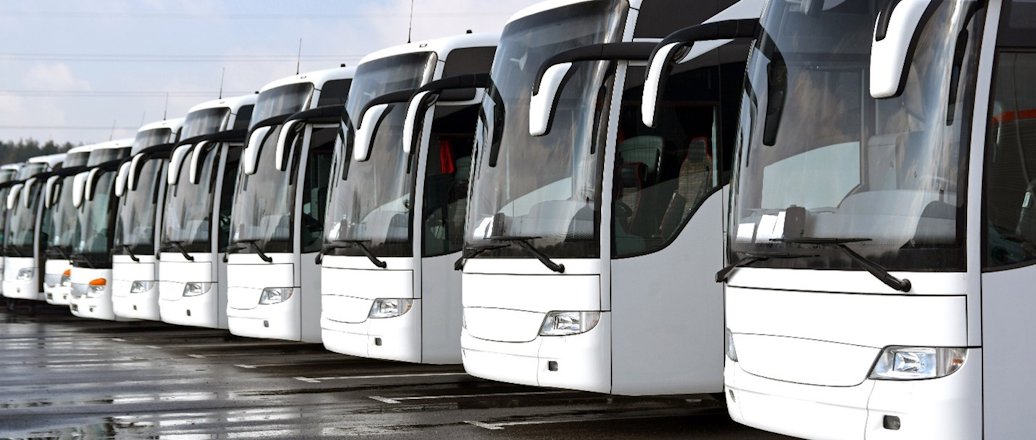 Passenger buses on a parking lot