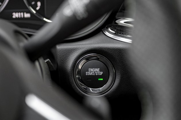 Interior engine start and stop button in a car.jpg