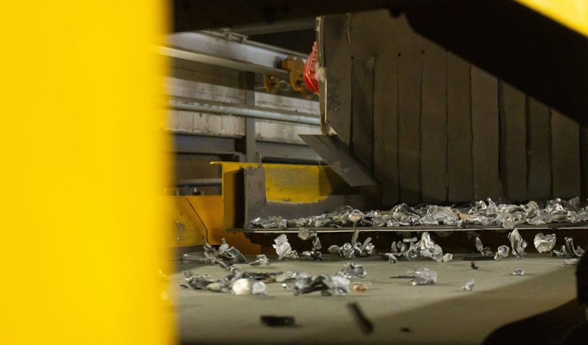 a dumpster with trash in it