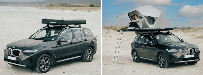a person standing next to a car with a surfboard on top