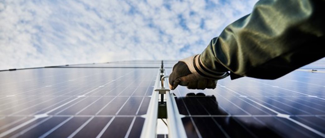 a hand holding a white bridge