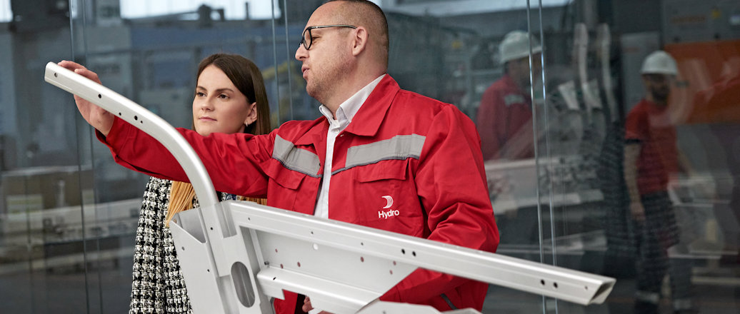a man and woman in red jackets