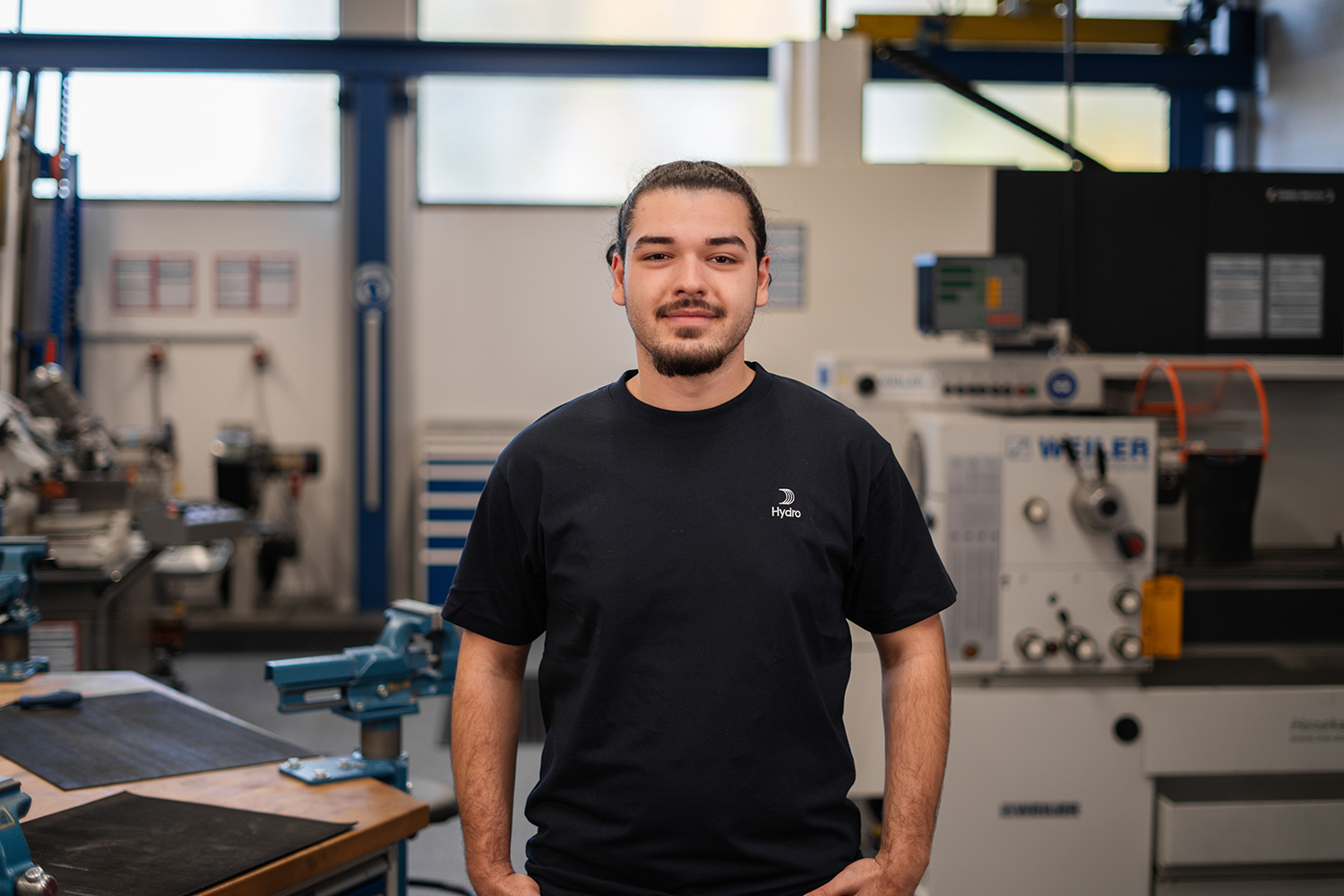 a man standing in a factory