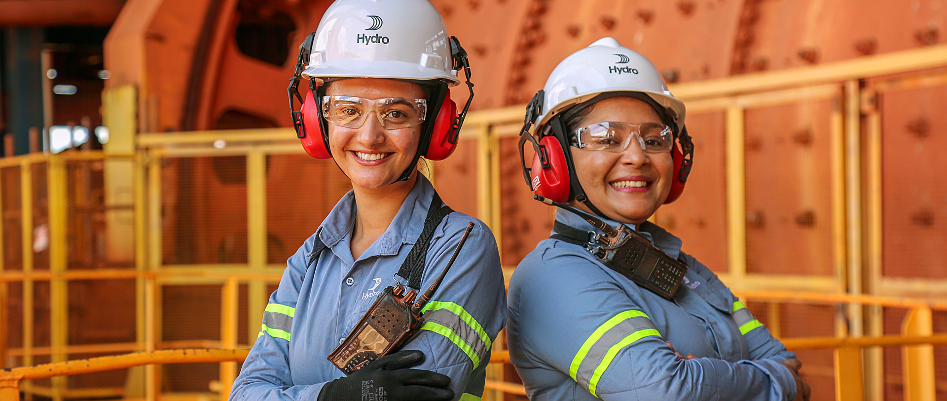 a few firemen wearing helmets