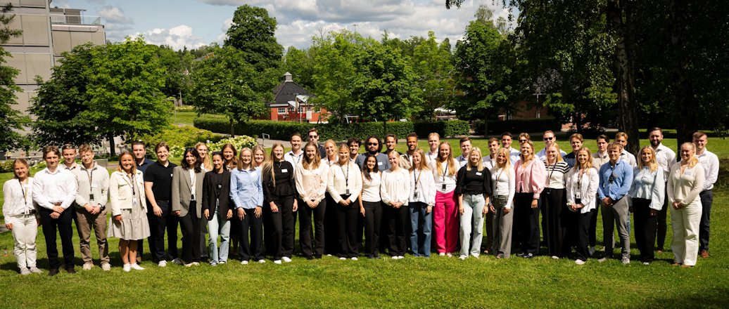 a group of people posing for a photo