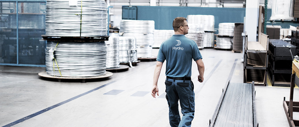 worker at aluminum factory floor
