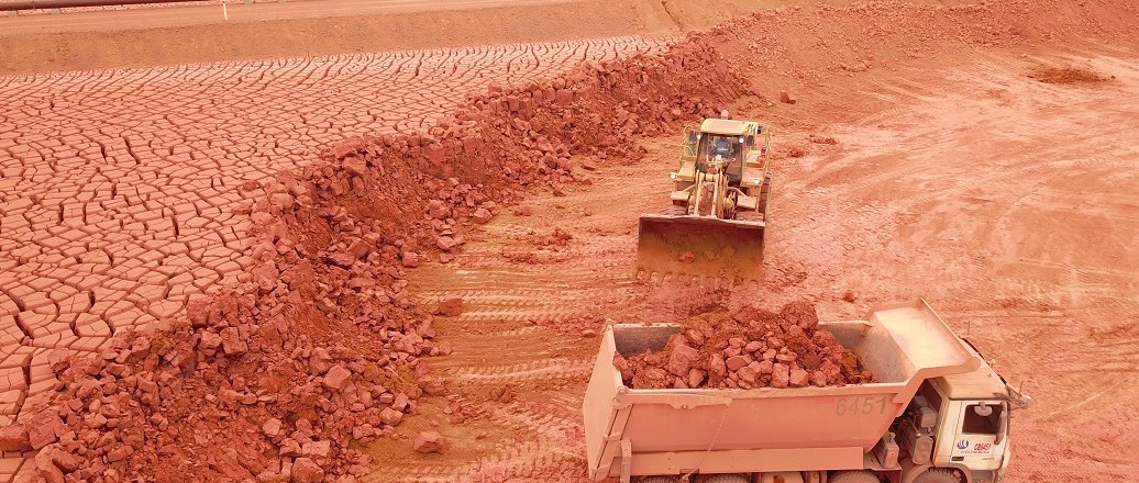a few trucks in a field