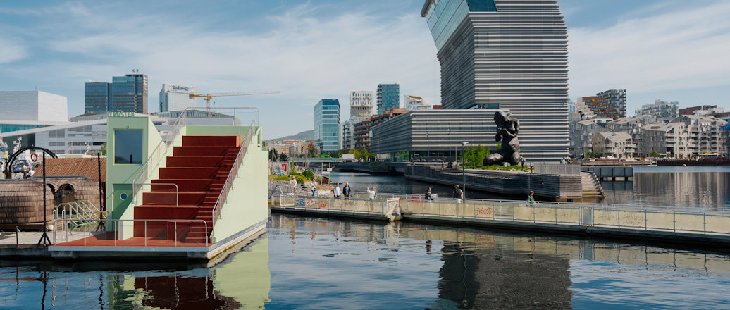 a body of water with buildings along it