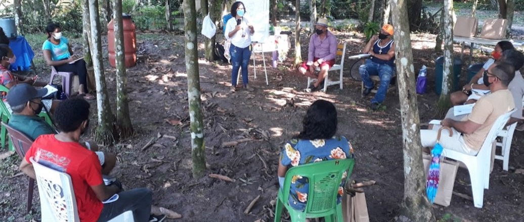 a group of people sitting in chairs