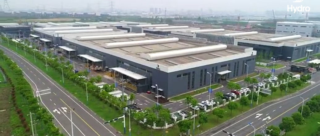 a large building with a parking lot