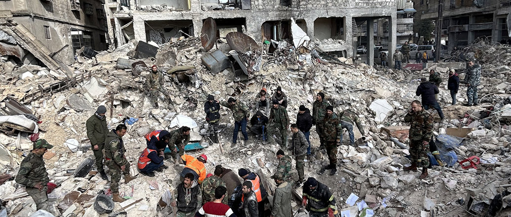 Rescue workers searching the ruins for survivors