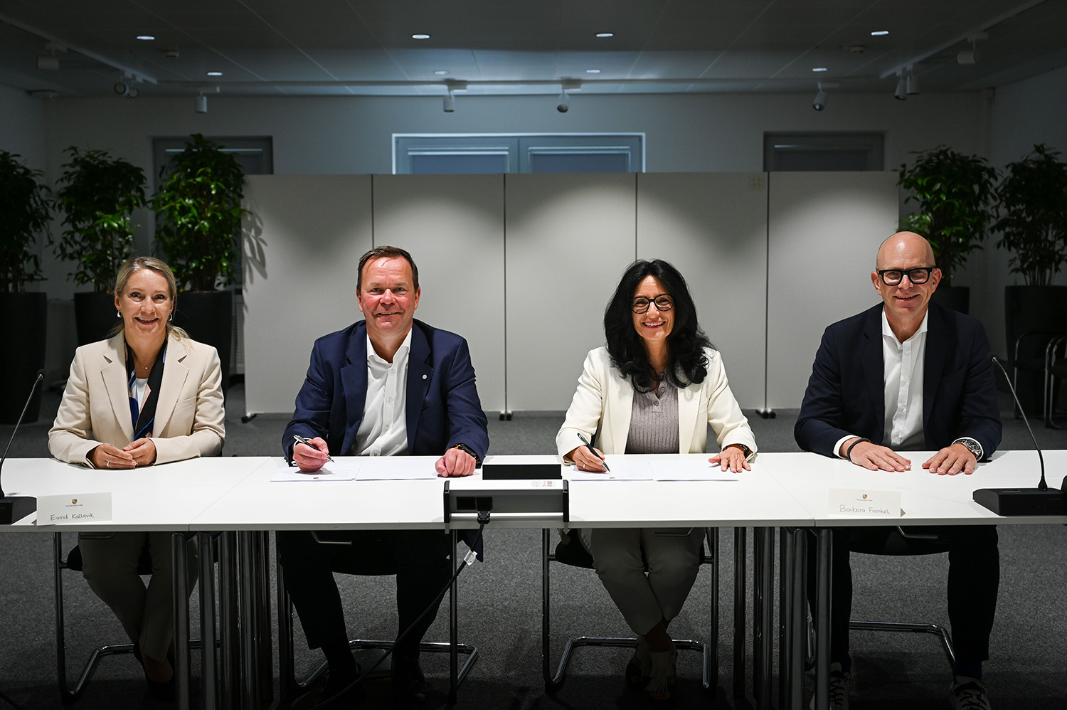 a group of people sitting at a table