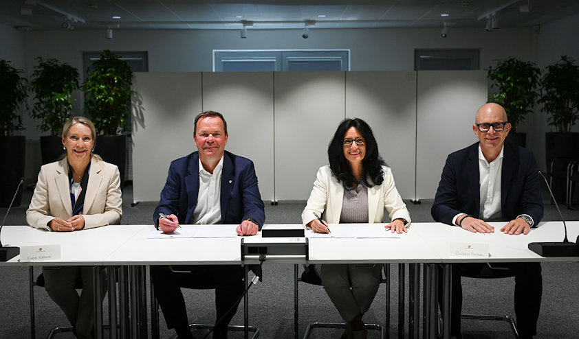 a group of people sitting at a table