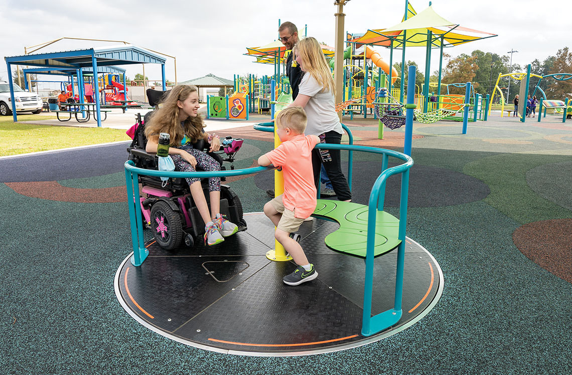 a group of people at a playground