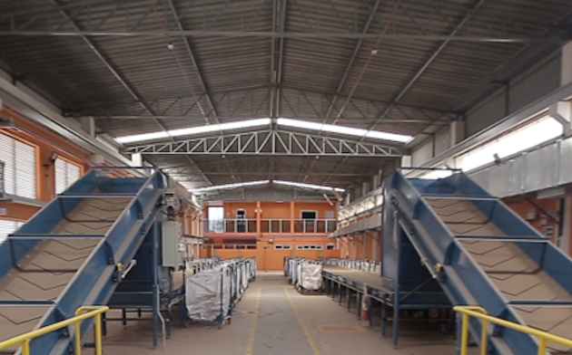 a warehouse with blue and yellow walls