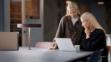 a few women sitting at a table