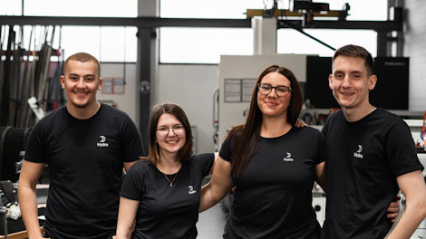 a group of people posing for a photo