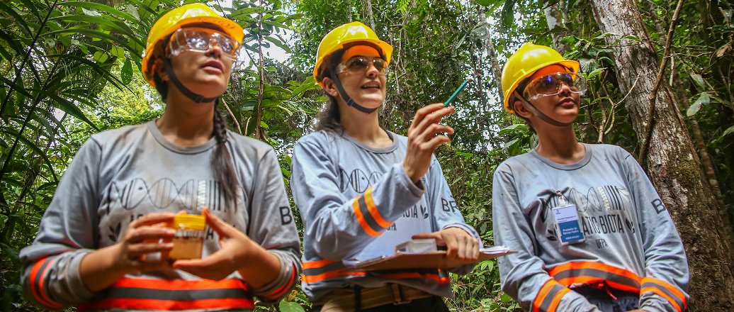 a group of firemen in helmets