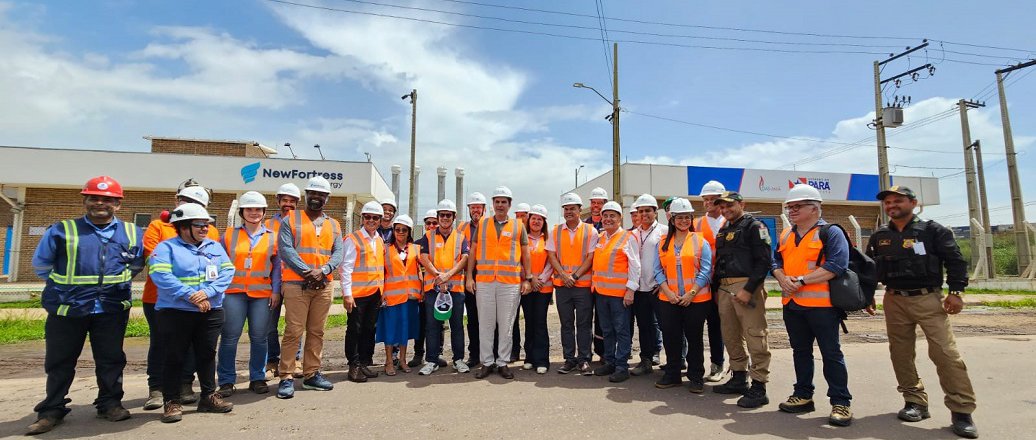 a group of people wearing safety vests
