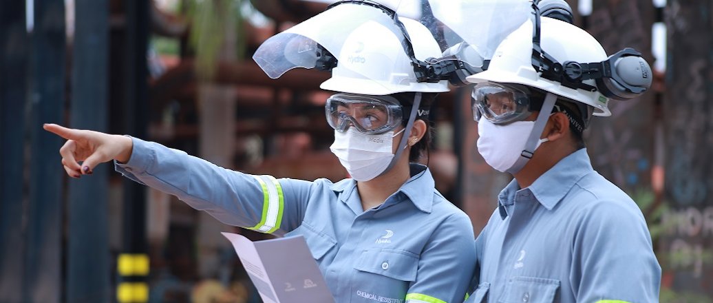 a couple of people wearing helmets and goggles