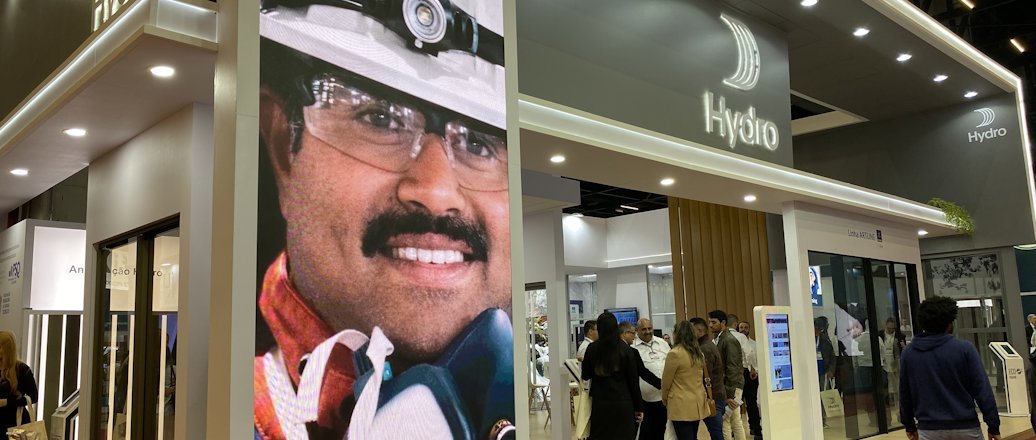 a man's face on a poster in a building