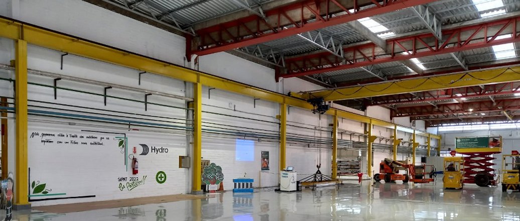 a large warehouse with a sign