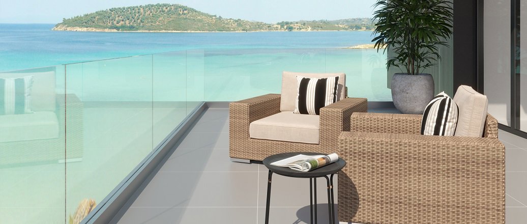 a balcony overlooking the ocean