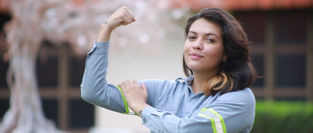 a woman with her arms raised