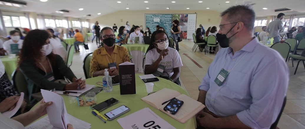 a group of people sitting at a table