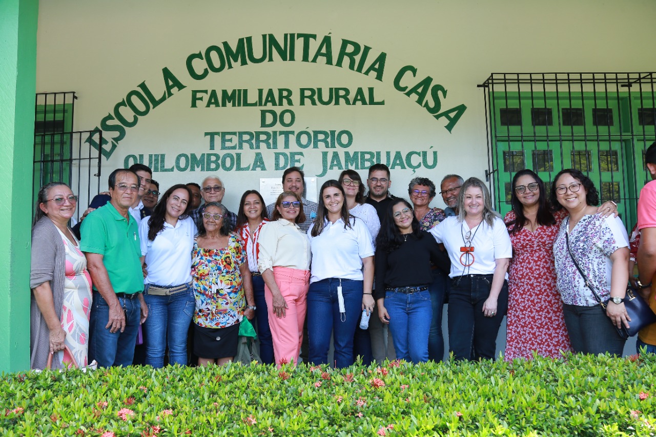a group of people posing for a photo