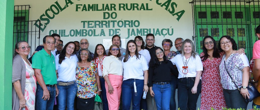 a group of people posing for a photo