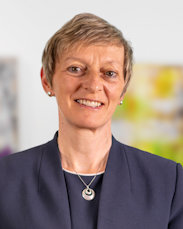 a close-up of a man smiling