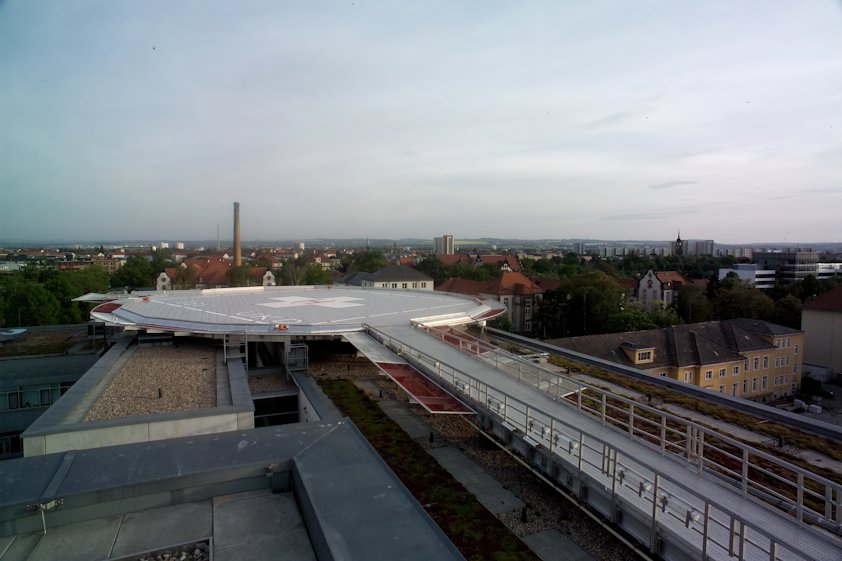 a large metal structure with a walkway over it