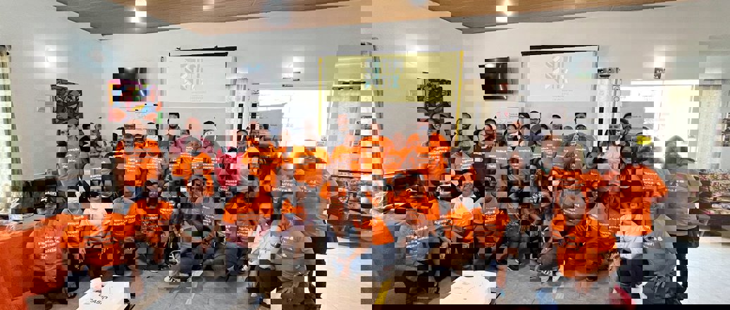 a group of people posing for a photo